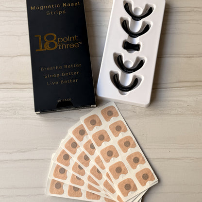 Magnetic Nasal Strips box with the four frame sizes in their tray and sheets of patches