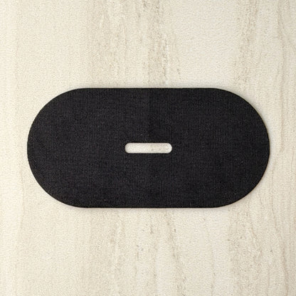 Close-up of 18pointthree mouth tape showing the vent hole through the centre