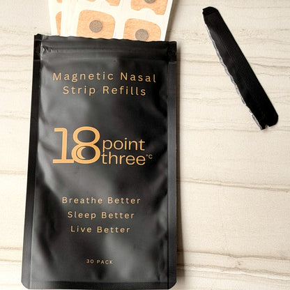 Refill pouch on stone with a reusable magnetic frame alongside
