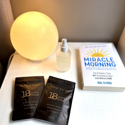 18pointthree Mouth Tape and Nasal Strips pouches on a bedside table